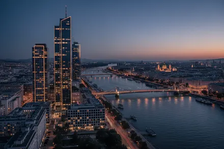 Investor meeting at a polished conference table with Vienna city views